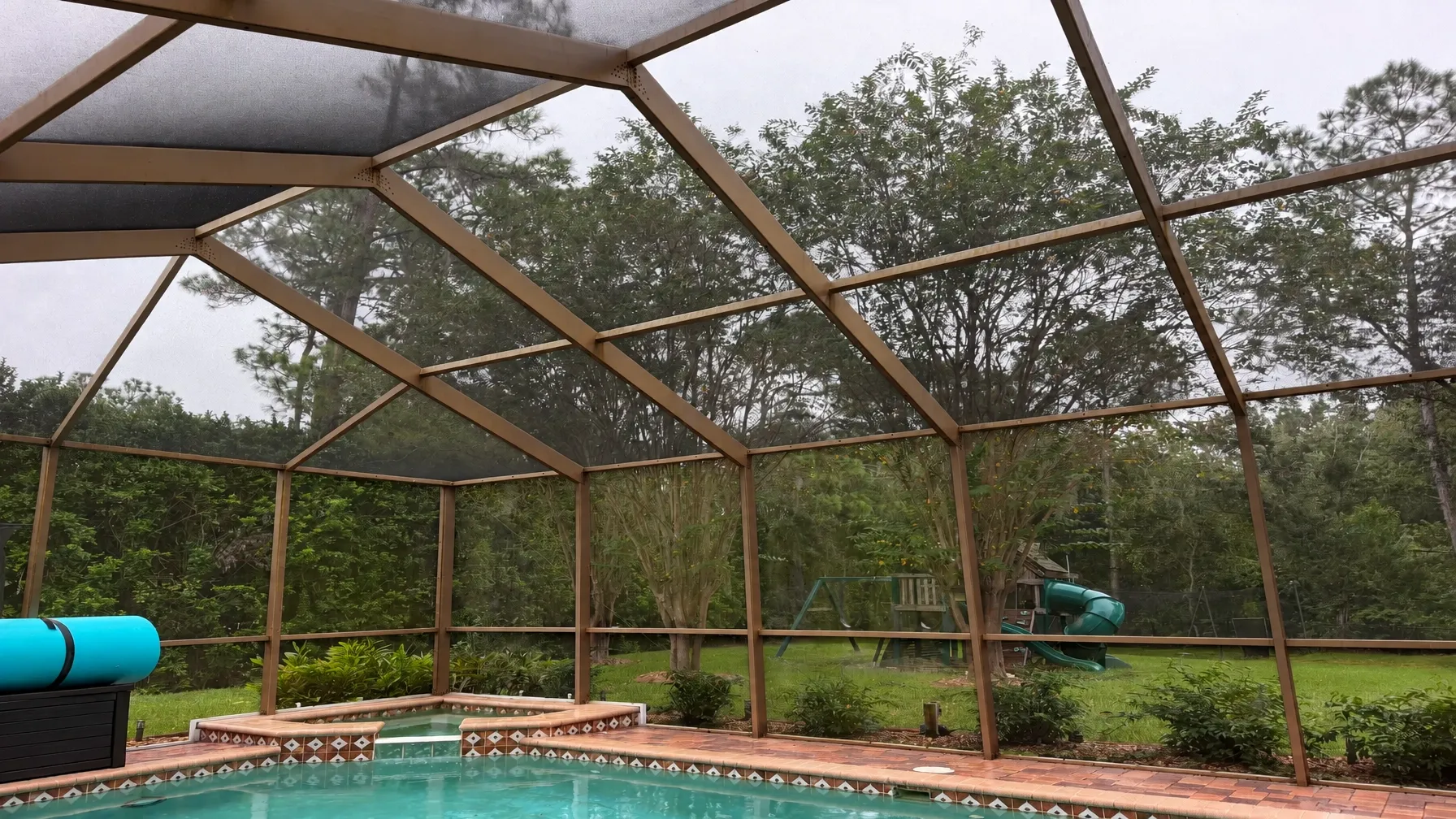 AI-generated bronze-color concept showing a pool enclosure frame recolored from white to bronze; presented as a restoration visualization, not a completed project.